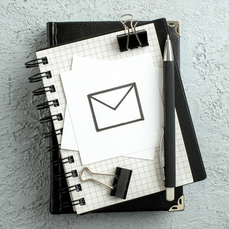 notebook with a pen